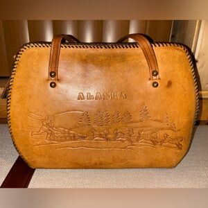 Custom tooled Alaska leather dog mushing dog sledding kayaking buffalo purse.